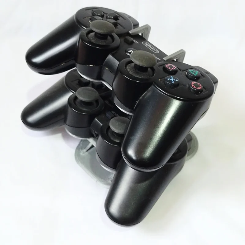 Suporte para controle de playstation 2, playstation 3 ou computador.